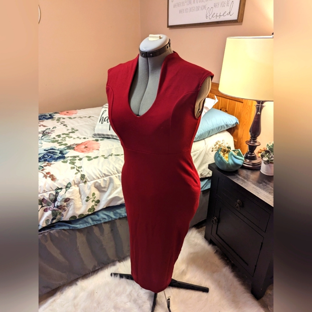 Red sleeveless dress with low neck size L